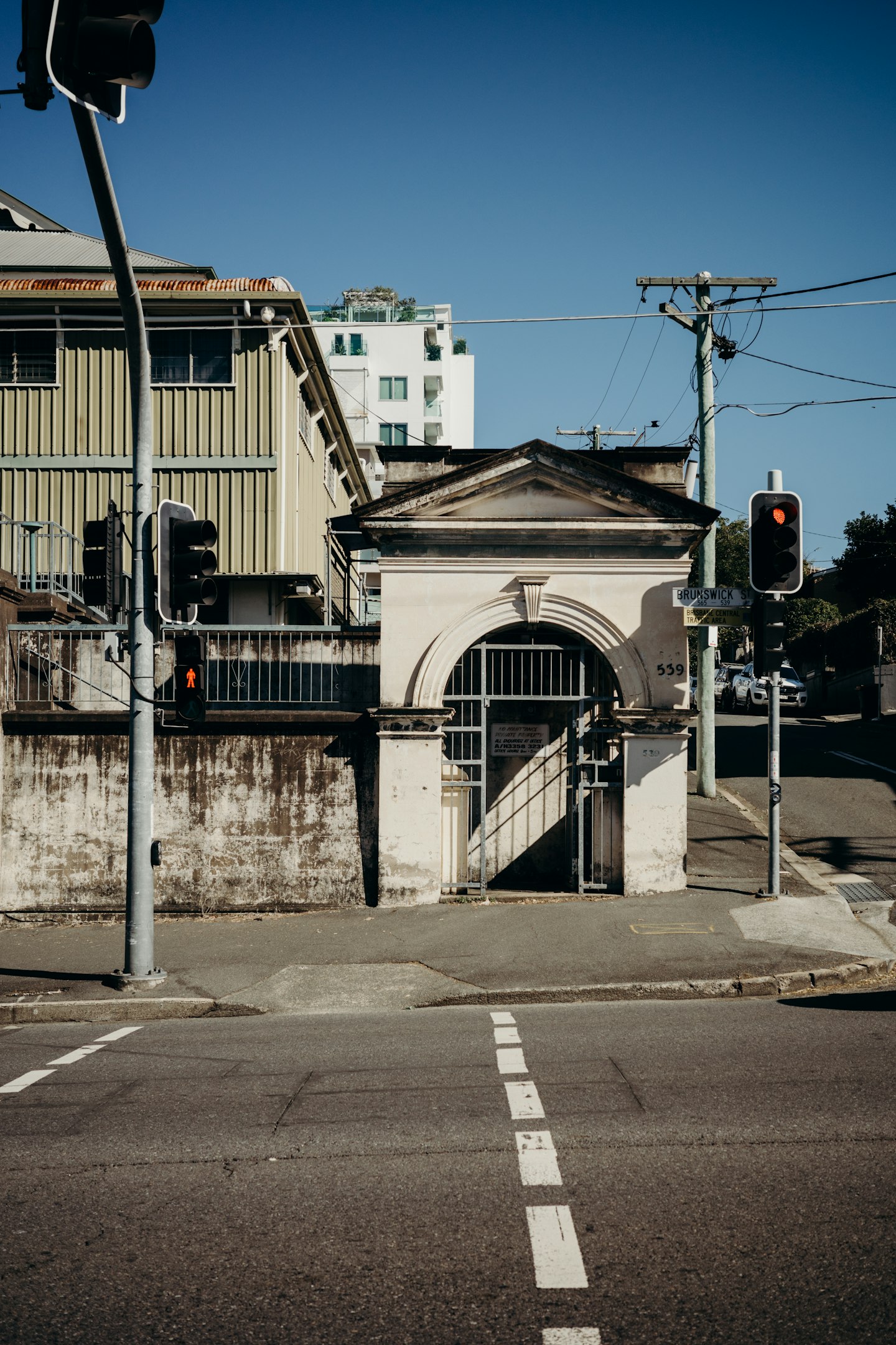 People crossing a street in central Brisbane